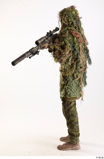 Andrew Elliott in Ghillie Aiming Gun aiming gun standing whole…